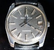 A gentleman's stainless steel Universal Unisonic manual wind wrist watch, on a leather strap, case