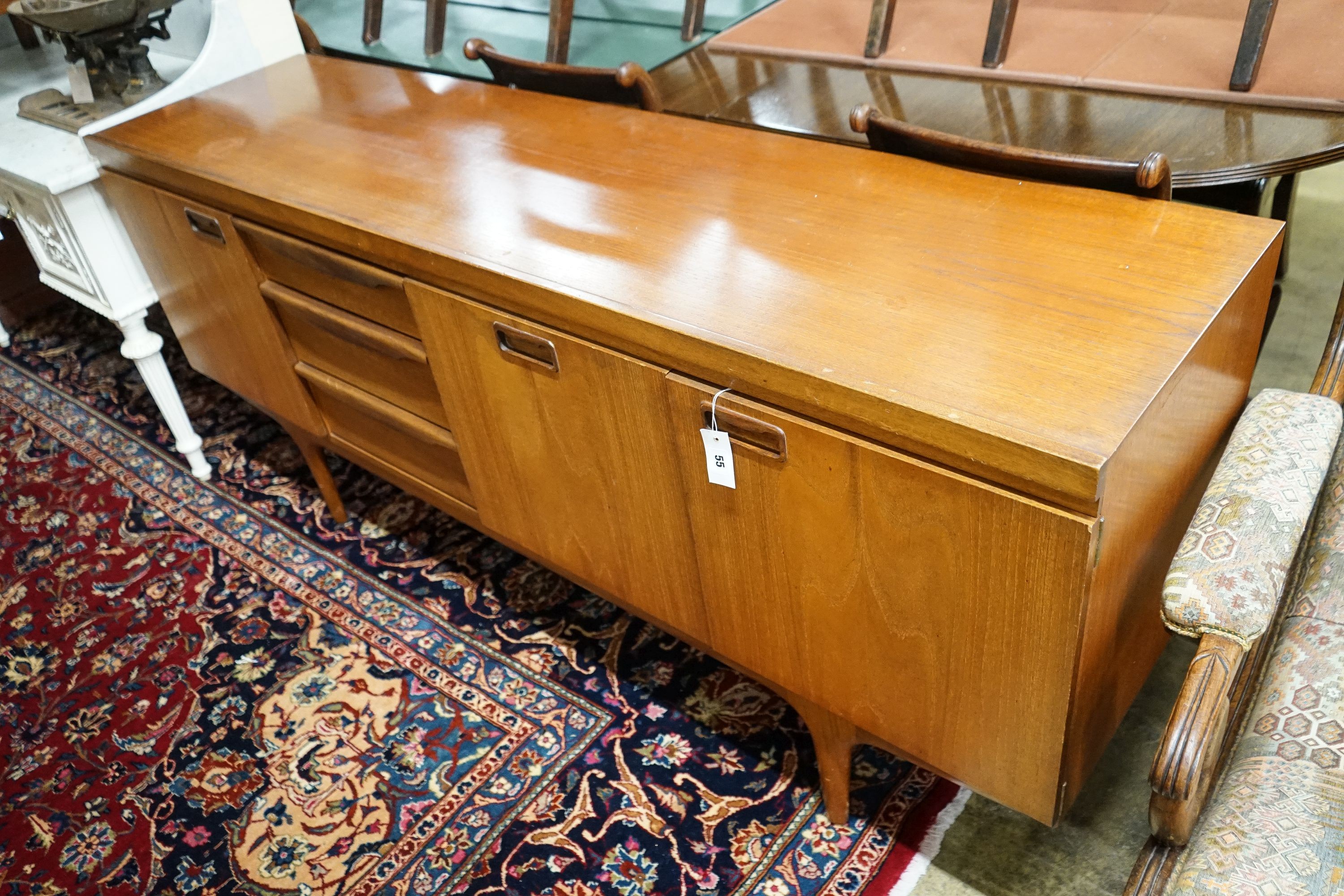 A mid 20th century design teak sideboard, by Greaves and Thomas, length 176cm, depth 45cm, height