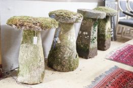 Four weathered staddle stones, largest width 44cm, height 74cm