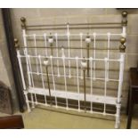 A Victorian style porcelain mounted iron and brass double bed frame, width 136cm