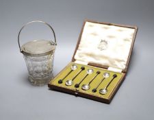 A cased set of six silver bean end coffee spoons and a George V silver mounted glass patent action