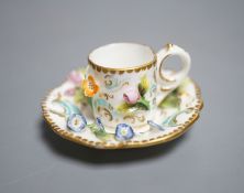 A Coalbrookdale miniature flower encrusted cup and saucer, c.1820. Provenance - Mona Sattin