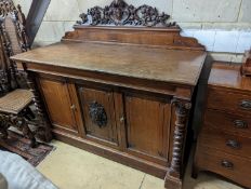 A Victorian oak side cabinet, length 150cm, depth 62cm, height 130cm