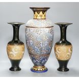 A large Doulton Slater's Patent vase, 46cm and a pair of similar smaller vases, 34cm