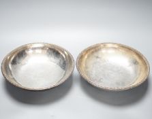 A pair of Keswick School of Industrial Arts silver plated bowls, on stylised spade feet, 23cm