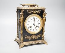 A 19th century French ebonised and ormolu-mounted mantel clock with key, 27cm including handle