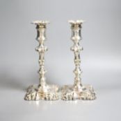 A pair of Victorian silver candlesticks, Henry Wilkinson & Co, London, 1867, (a.f.) 23.7cm,