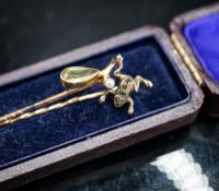 An early 20th century 9ct and gem set frog stick pin, stamped MB & Cie, 57mm and one other 9c and