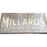 A painted wood advertising sign ‘MILLARDS BUILDERS DECORATORS’, pre war 33x67cm