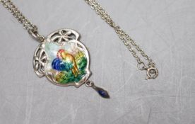 An Edwardian Art Nouveau silver and polychrome enamel set drop pendant, Birmingham, 1909, 43mm, on a