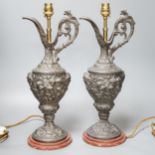 A pair of early 20th century spelter ewers mounted as lamps 42cm