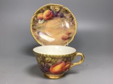 A Royal Worcester fruit painted large tea cup and saucer, signed P. Love, height 7cm overall