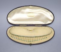 An Edwardian yellow metal, seed pearl and turquoise set fringe necklace, 42cm, gross weight 15.2