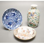 Two Chinese porcelain saucer dishes and an enamelled porcelain vase, 18th century and later, 12.5cm