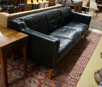 A mid century Danish black leather three seater sofa in the style of Borge Mogensen, length 201cm,