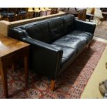 A mid century Danish black leather three seater sofa in the style of Borge Mogensen, length 201cm,