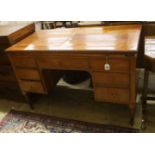 A late 19th/ early 20th century Italian walnut kneehole desk, width 122cm, depth 60cm, height 79cm