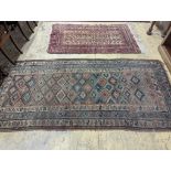 An antique Caucasian runner and a Belouch rug, larger 284 x 134cm