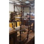 A Victorian mahogany walnut four-tier whatnot, (severely wormed) width 44cm, depth 30cm, height