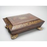 A William IV cut brass inlaid rosewood games box 30.5cm, containing Reynolds & Sons woodblock and