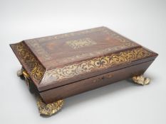 A William IV cut brass inlaid rosewood games box 30.5cm, containing Reynolds & Sons woodblock and