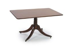 A Regency rectangular mahogany tilt top dining table, width 130cm, depth 80cm, height 72cm