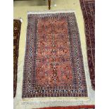 A North West Persian design peach ground rug, 160 x 102cm