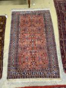 A North West Persian design peach ground rug, 160 x 102cm