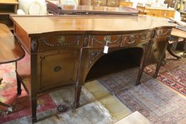 An early 20th century Adam design mahogany serpentine sideboard, length 214cm, depth 68cm, height