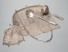 A George silver Arts & Crafts spoon, by Albert Edward Jones, two white metal mesh evening bags and a