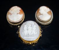 A Victorian 9ct mounted oval cameo shell brooch, one other later 9k mounted cameo brooch and a