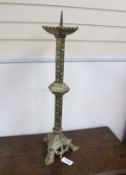 A brass eclisiastical candlestick, height 82cm