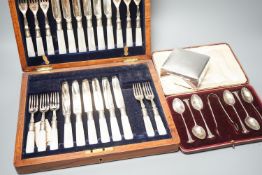 A cased set of silver teaspoons and tongs, a silver mounted cigarette case and plated part dessert
