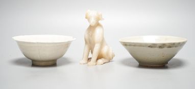 Two Chinese Qingbai bowls, probably Song Dynasty, largest 13cm and a Chinese soapstone figure of a