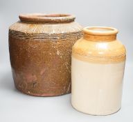 Two stoneware storage jars, largest 30cm