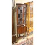 An Edwardian banded mahogany bow fronted standing corner cabinet, width 52cm, depth 38cm, height