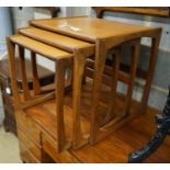 A nest of three rectangular G Plan teak tea tables, width 53cm, depth 43cm, height 48cm