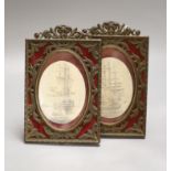 A pair of simulated scrimshaw panels, Victory and Foudroyant, in frames