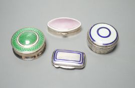 Three assorted early 20th century silver and enamel pill boxes, largest 49mm and a later similar