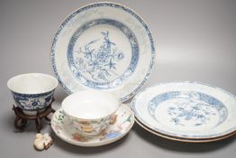A 19th century Chinese famille rose bowl and saucer, a blue and white tea bowl on stand, a hardstone
