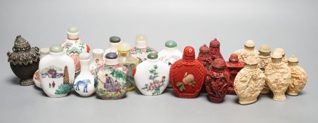 A collection of Chinese snuff bottles, 20th century, including a carved cinnabar lacquer and