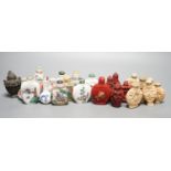 A collection of Chinese snuff bottles, 20th century, including a carved cinnabar lacquer and