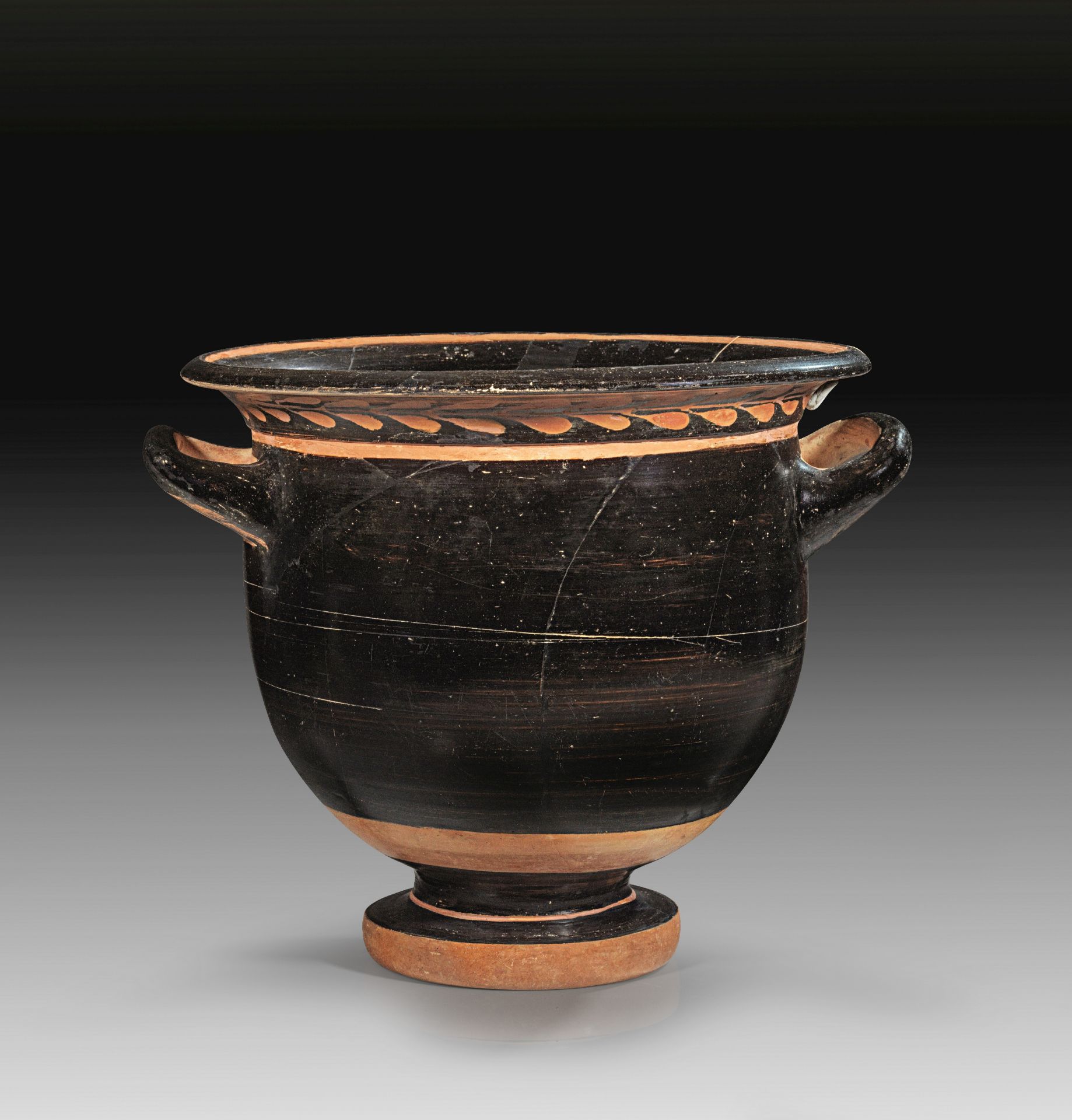 Attic bell krater with red-figure laurel-wreath and black glaze.