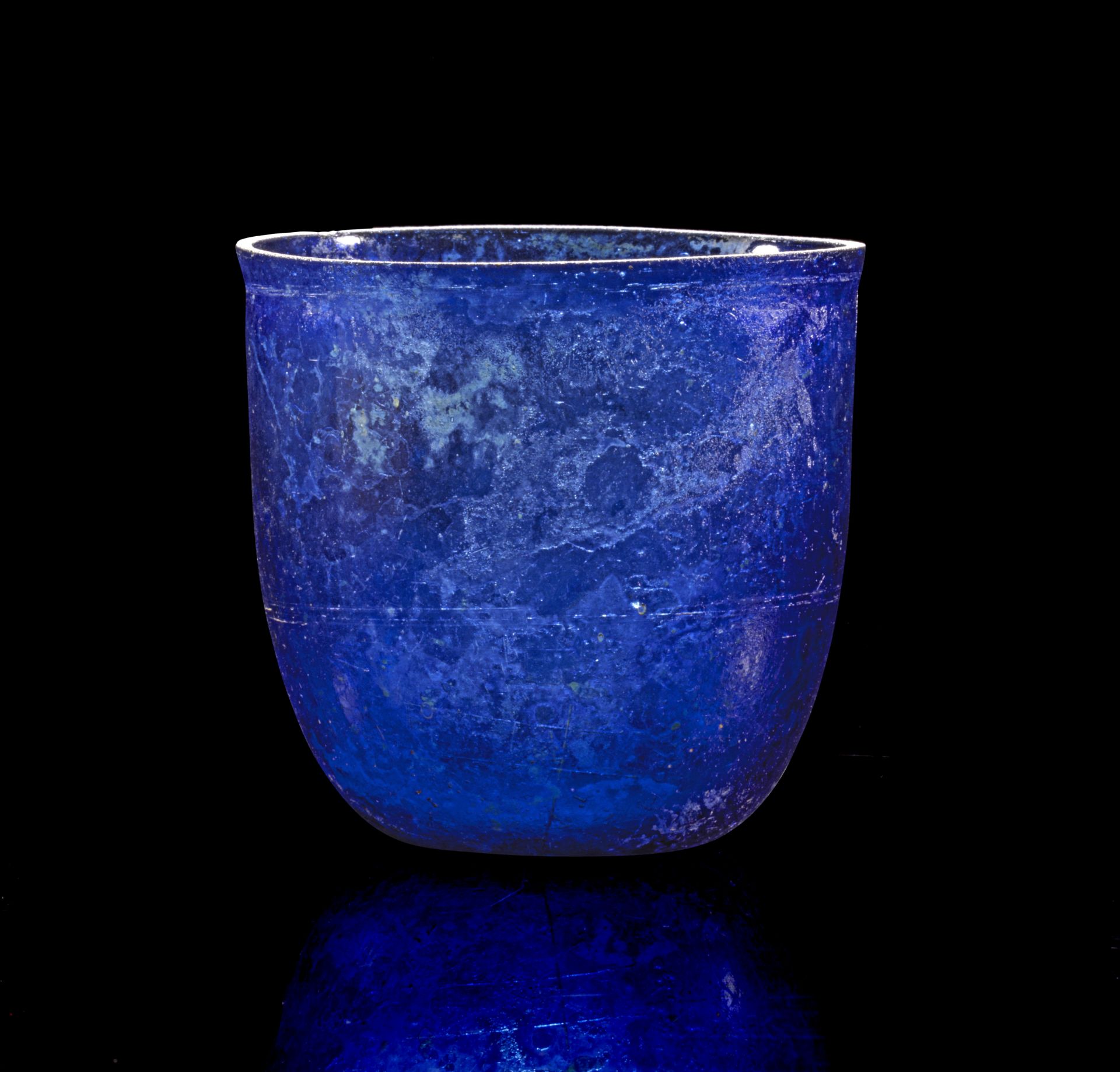 Blue glass beaker.