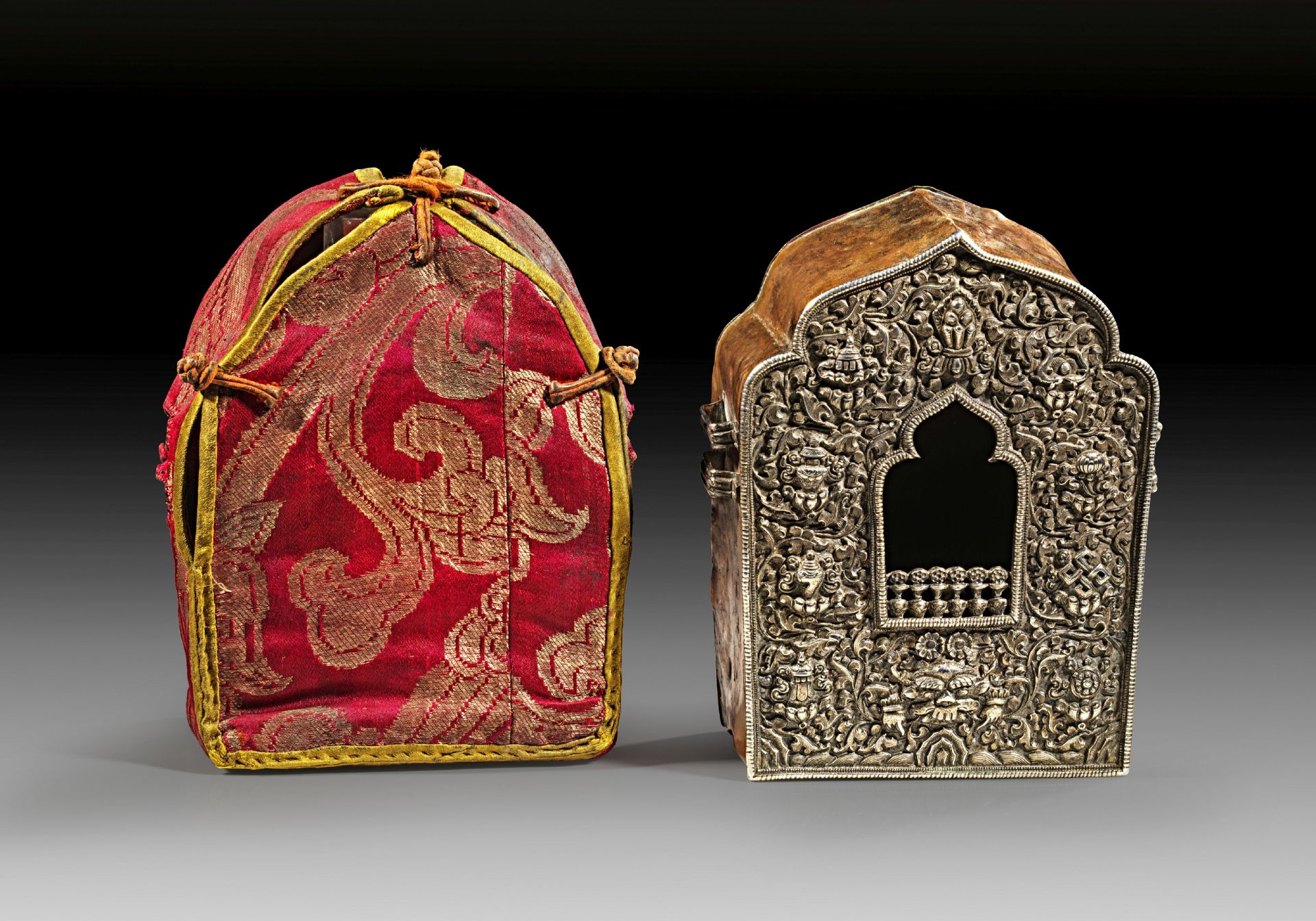 Large Ga'u reliquary shrine of silver and copper with original textile cover.