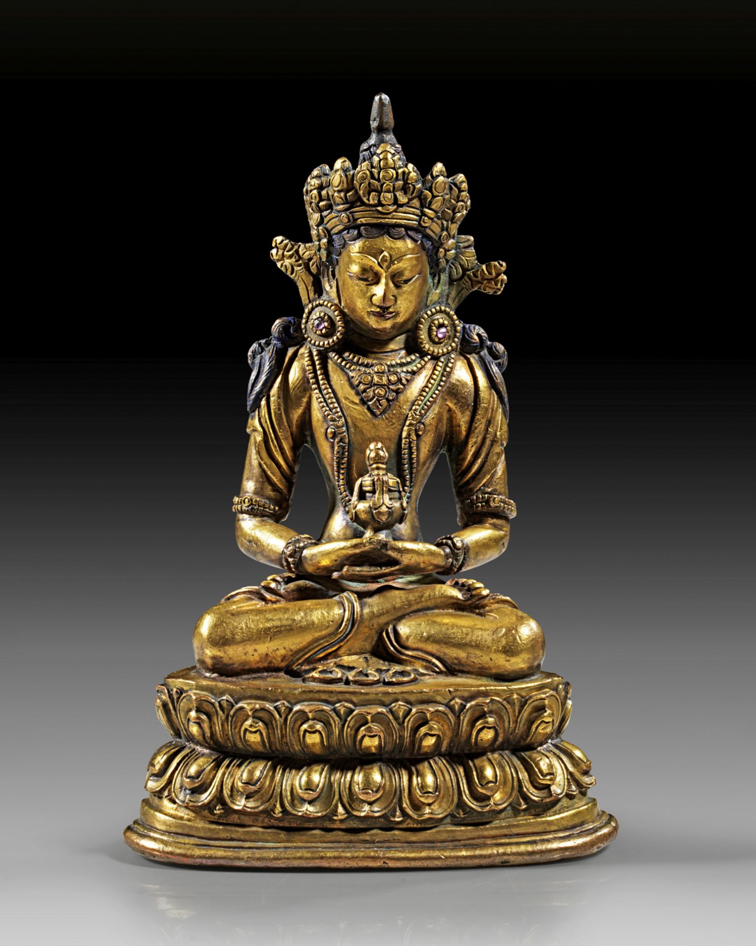 Bronze gilded figure of Amitayus on a double lotus base.