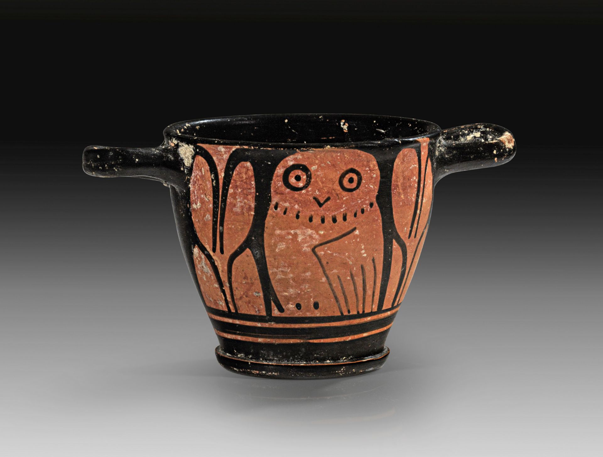 Apulian red-figure owl-skyphos.