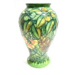 AN EXTREMELY LARGE LIMITED EDITION MOORCROFT POTTERY VASE DECORATED IN THE 'RAIN FORSET' PATTERN