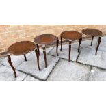 A SET OF FOUR OCCASIONAL TABLES the circular tops 41cm diameter stamped underneath 'Pro Patent No