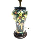 A MOORCROFT POTTERY 'HOLLY HATCH' PATTERN TABLE LAMP designed by Rachel Bishop, 36cm high